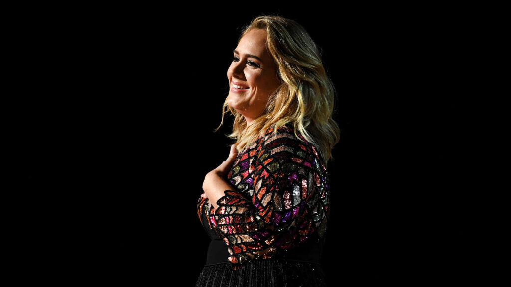 Adele's Radiant Confidence: Stunning Wallpaper Background