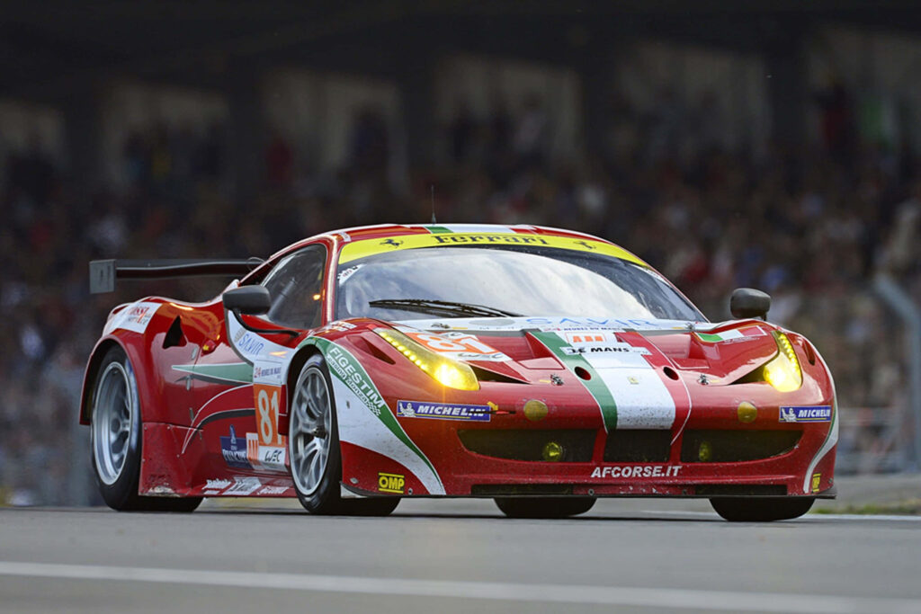 Iconic Red Beauty: The Revered Classic Ferrari That Enthralls Aspiring Aficionados Worldwide Wallpaper