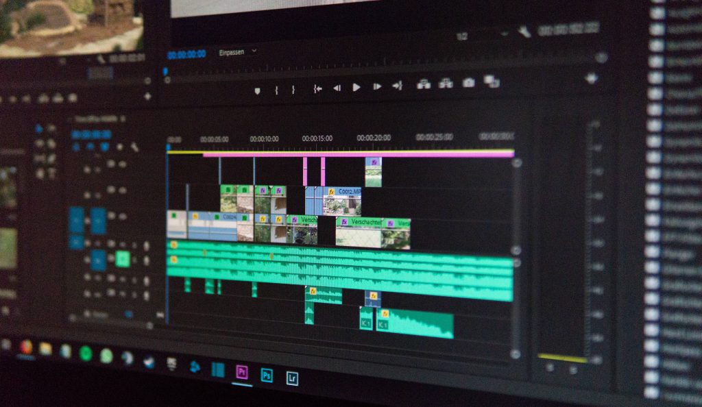 Adobe Premiere Pro dark interface showing detailed video audio timeline for editing enthusiasts Wallpaper