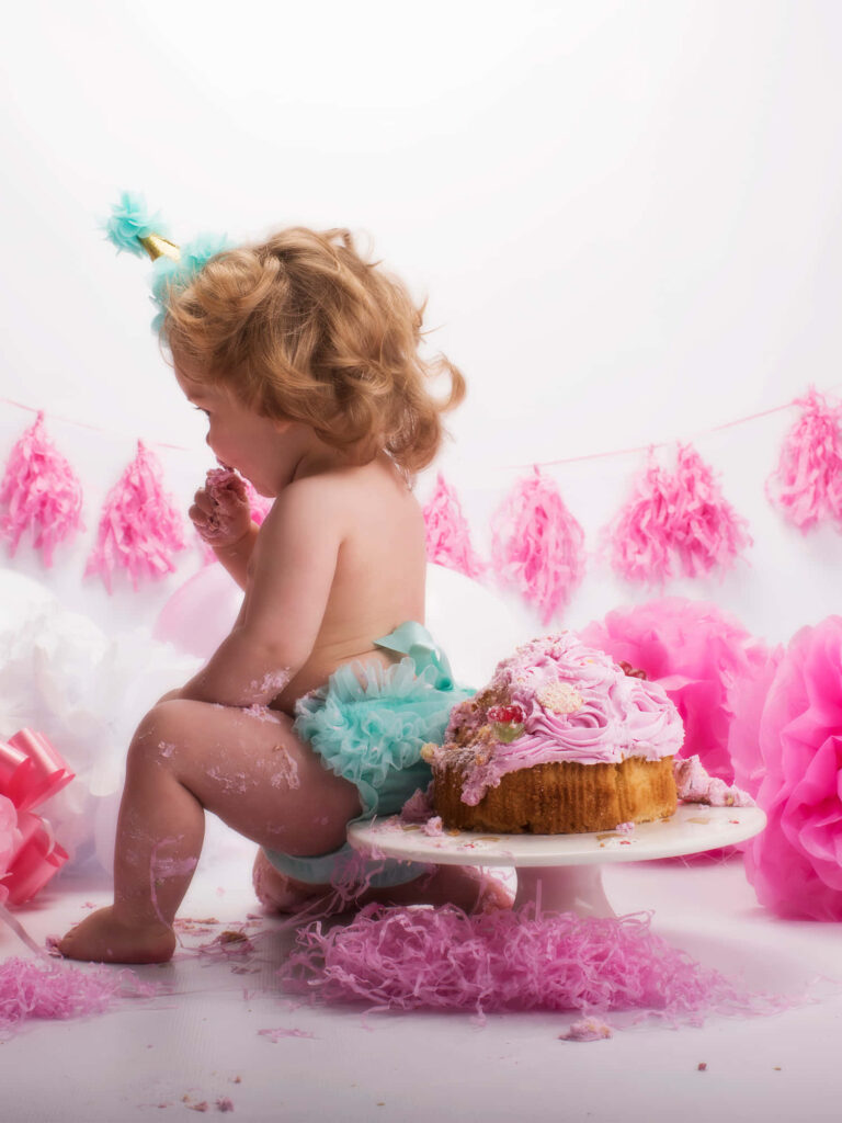 First Birthday Cake Smash: Cute Baby in Pink Pastel Decor Wallpaper