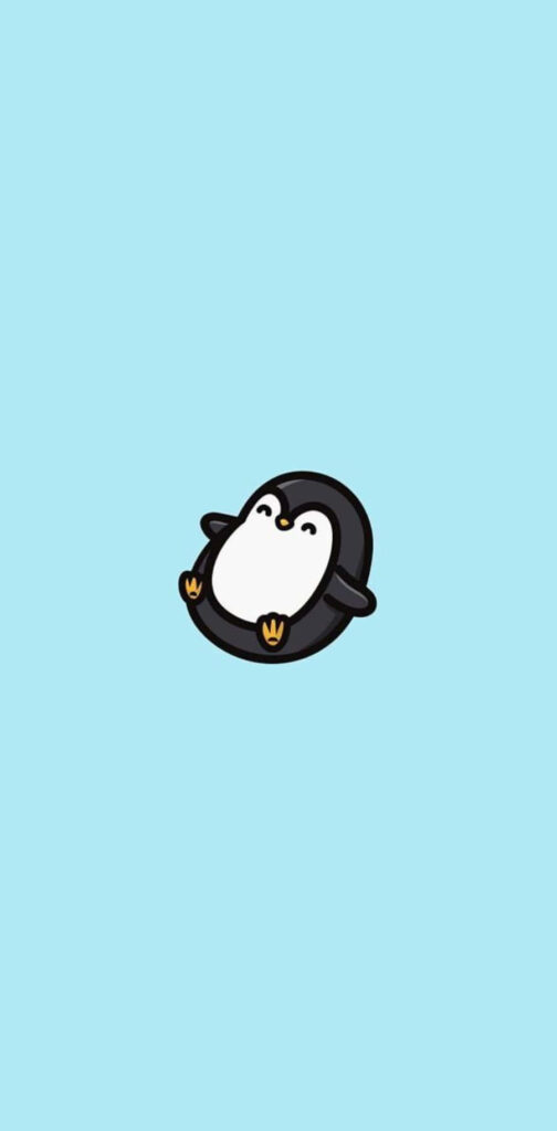 Adorable Baby Emperor Penguin Wallpaper on Light Blue Background