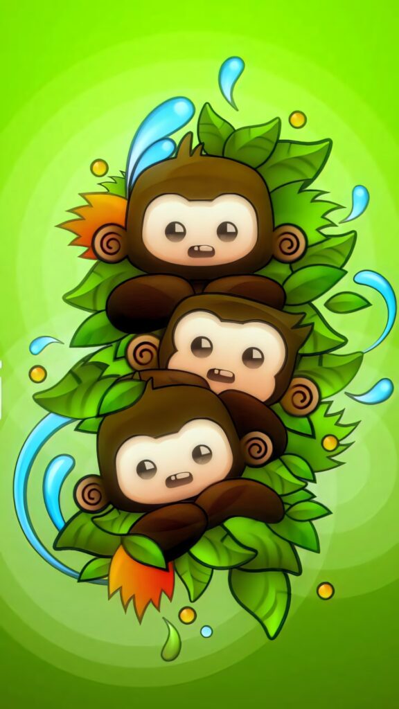 Vibrant Baby Monkeys Wallpaper: Tropical Fun & Lively Background