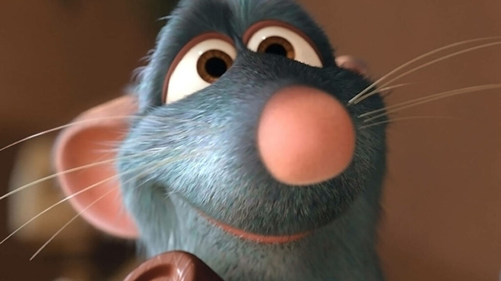 Flufftastic Close-up: Remy's Adorable Face in the Ratatouille World Wallpaper