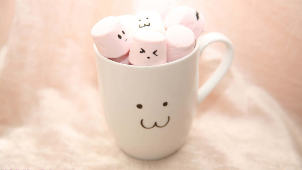 Cheerful Wallpaper: Smiling Cup with Cute Pink Marshmallow Friends
