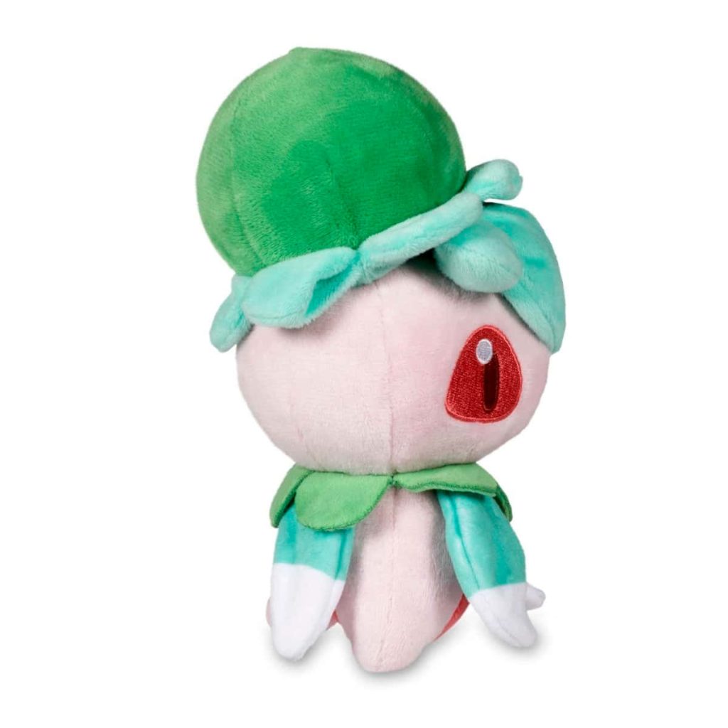 Adorable Fomantis plush toy with pink body green leaf head bright red eye on white background Wallpaper
