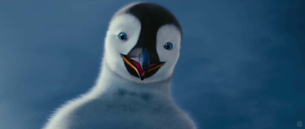 Adorable Penguin Chick from Happy Feet Two - Joyful Blue Background Wallpaper