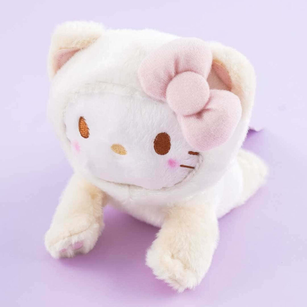Adorable Plush Hello Kitty Wallpaper: Kawaii Pastel Design