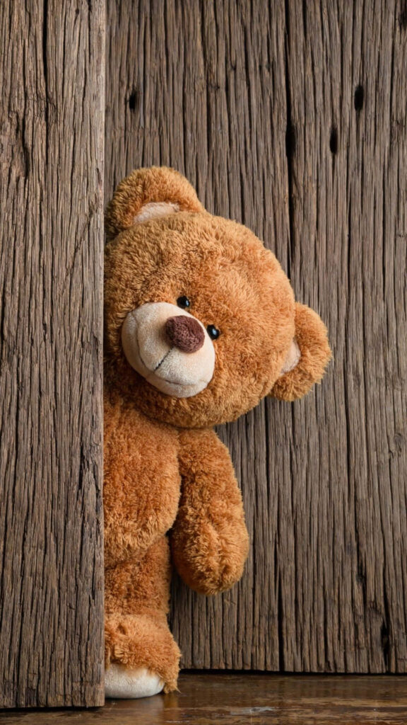 Charming Teddy Bear Wallpaper: Cozy Rustic Background Delight