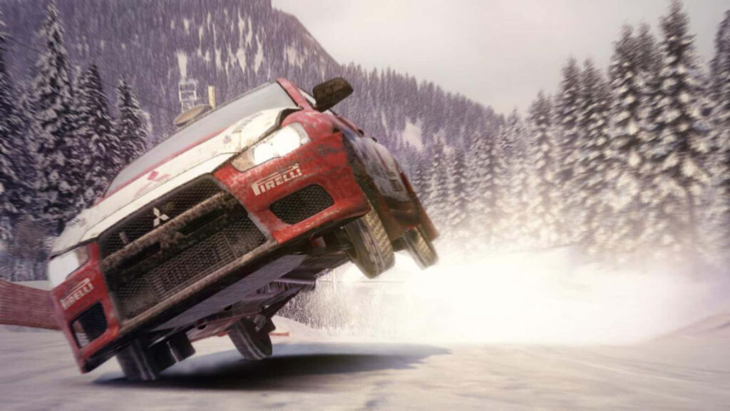 Mitsubishi rally car jumps on snowy track in Dirt 3, showcasing dynamic weather effects and intense speed Wallpaper
