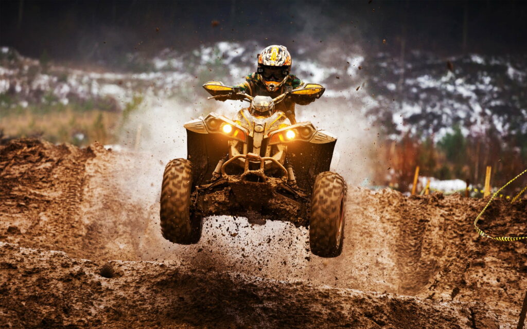 Thrilling Terrain Trials: ATV Motocross Action in Stunning QHD Wallpaper