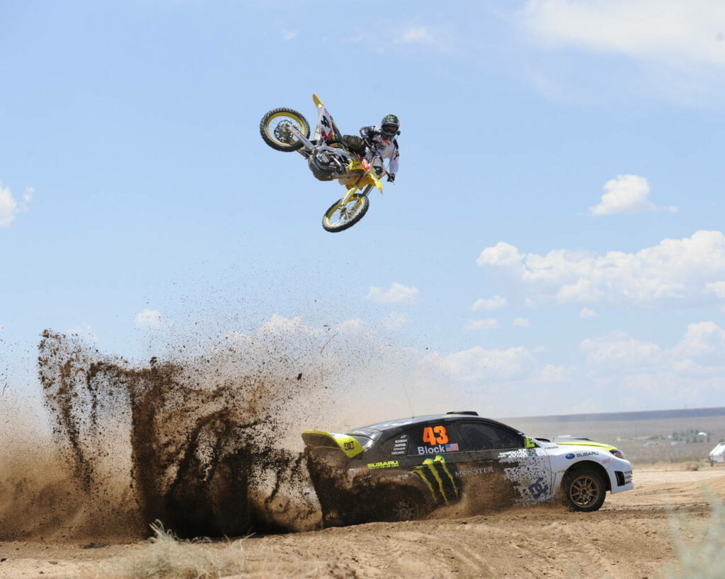 Epic Motorsports Wallpaper: Motocross Jump & Rally Car Drift