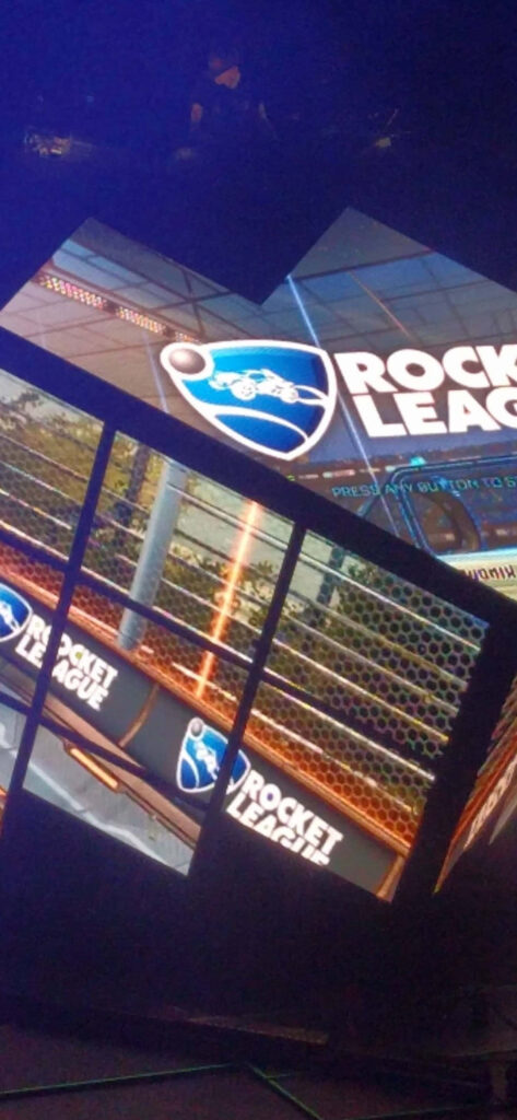 Rocket League's Thrilling Ball in a Vibrant Blue Setting: Captivating Visuals Inspiring Competitive Euphoria Wallpaper