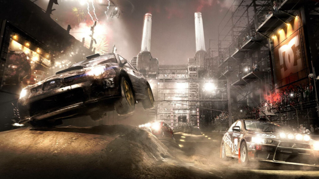 Roaring Racecars Amidst the Chaotic Dirt Showdown Wallpaper