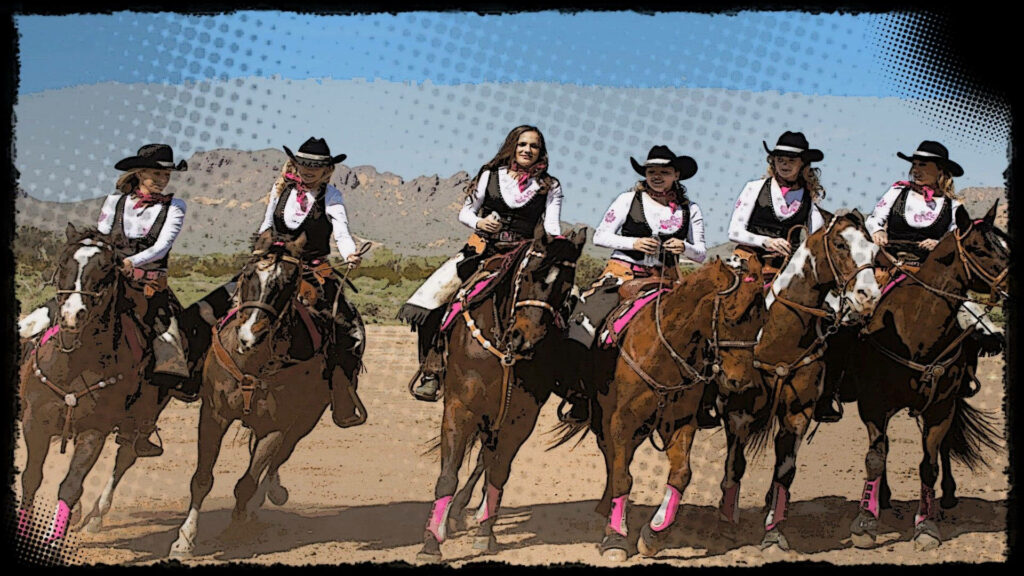 Cowgirls riding horses at sunset in western attire on dusty terrain with rugged mountain backdrop Wallpaper