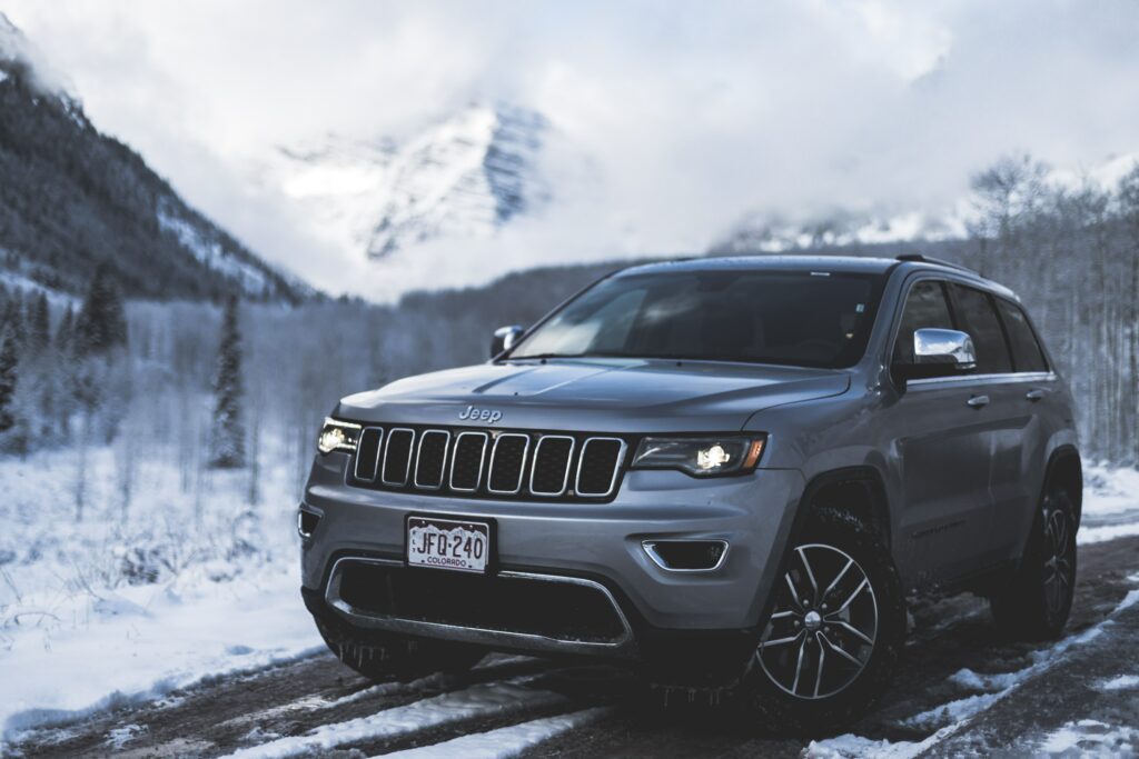 Off-Road SUV in Snowy Landscape: Adventure Awaits Wallpaper