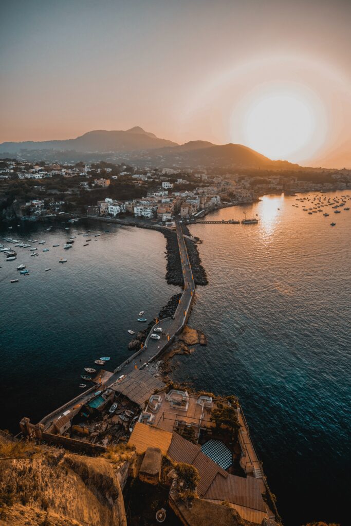 Stunning Aerial City Wallpaper: Serene Sunset by the Sea