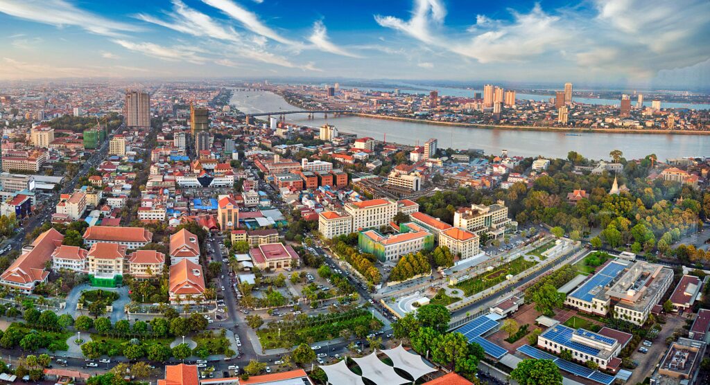 Aerial Cityscape Wallpaper: Modern Meets Traditional Architecture