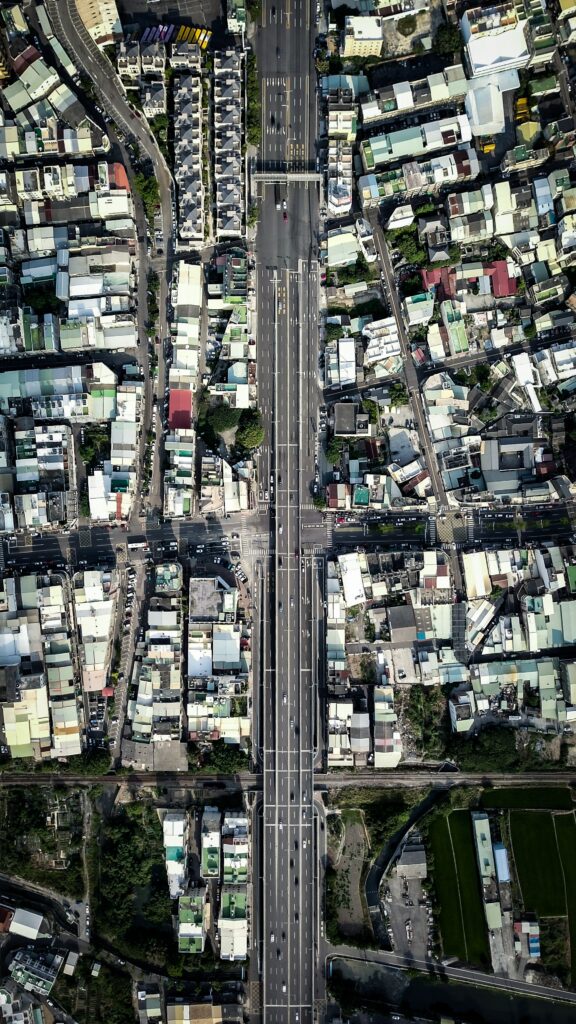 Stunning Aerial Cityscape Wallpaper: Vibrant Urban Design Background