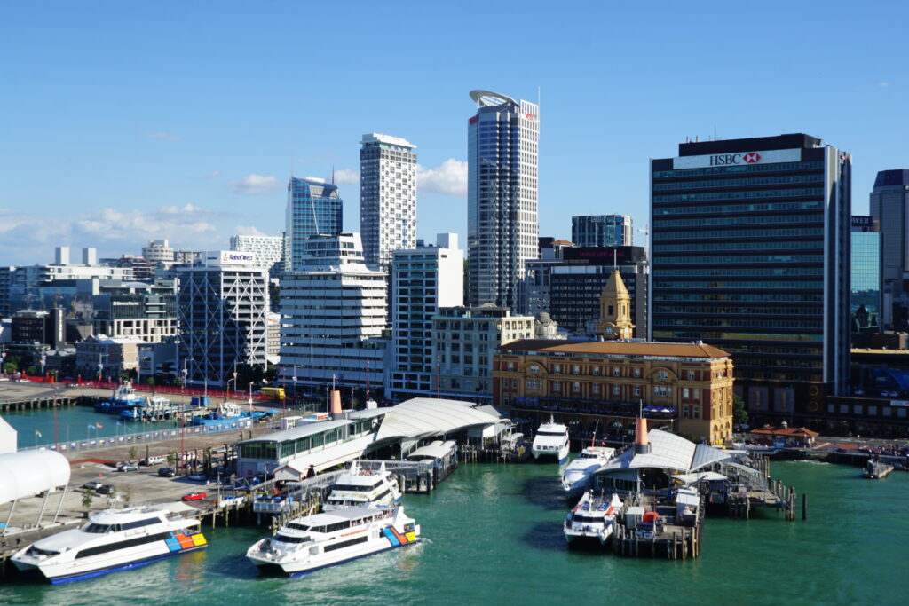 Vibrant Cityscape Wallpaper: Aerial View of Waterfront and Modern Architecture