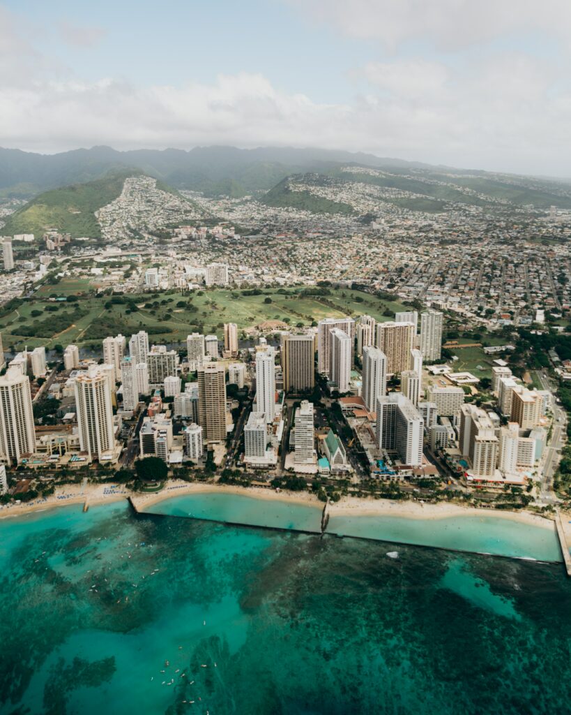 Stunning Coastal City Aerial Wallpaper: Beach, Skyline & Hills