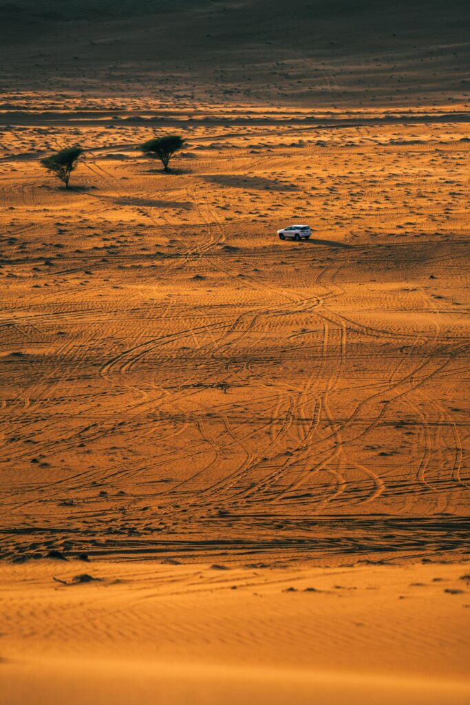 Aerial Desert Landscape Wallpaper: Adventure in Golden Sand Dunes