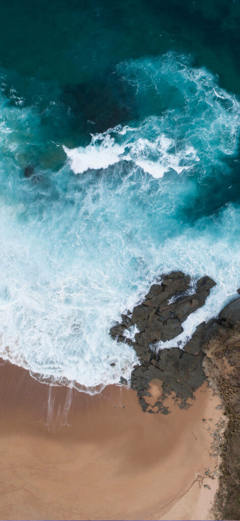 Aerial Ocean Scene Wallpaper: Blue Waters & Sandy Beach Background