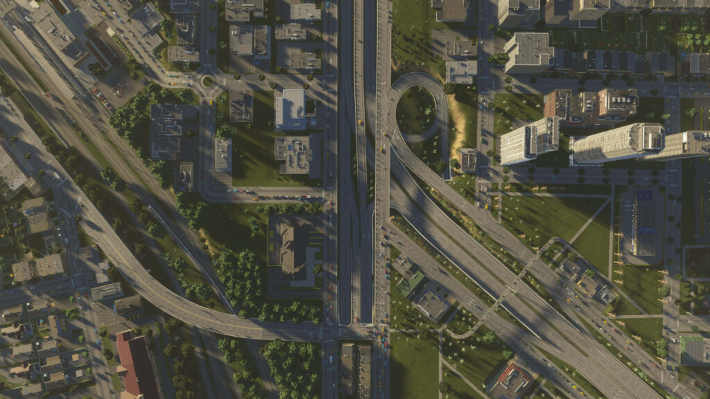 Aerial Urban Overpass Wallpaper: Cityscape & Green Spaces Background