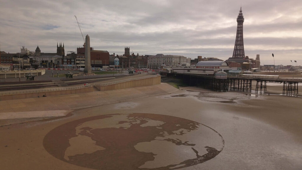 Aerial View of Earth Sculpture near Blackpool Tower - Dramatic Art Wallpaper
