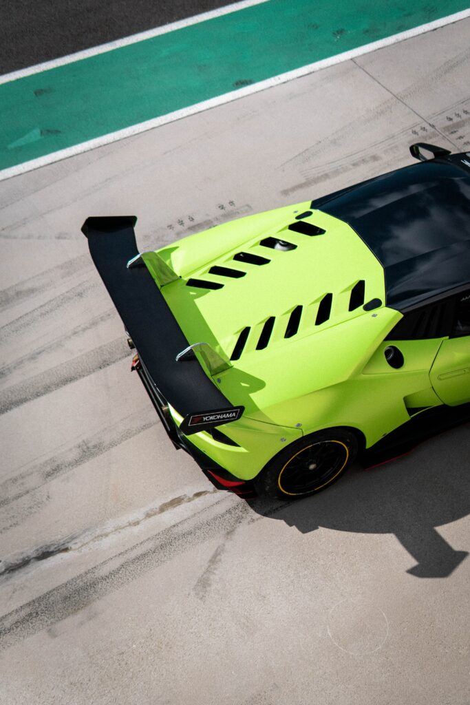 Aerial View of Vibrant Green Lamborghini Huracan - Luxury & Speed Wallpaper