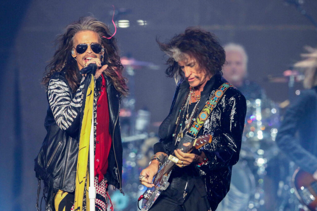 Iconic Aerosmith Wallpaper: Joe Perry & Steven Tyler Live Performance