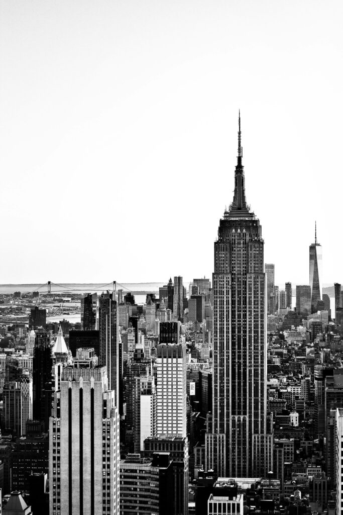 Black and white New York City skyline wallpaper with Empire State Building and One World Trade Center