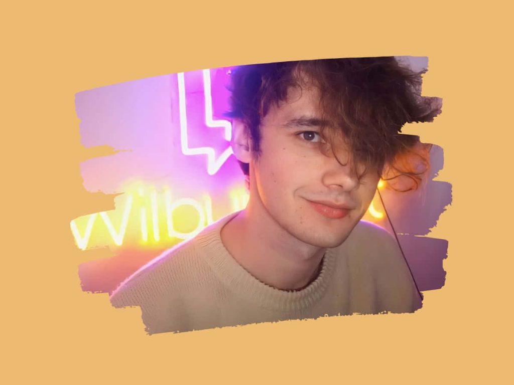 Aesthetic Wilbur Soot portrait in cream sweater neon glow digital paint stroke wallpaper background