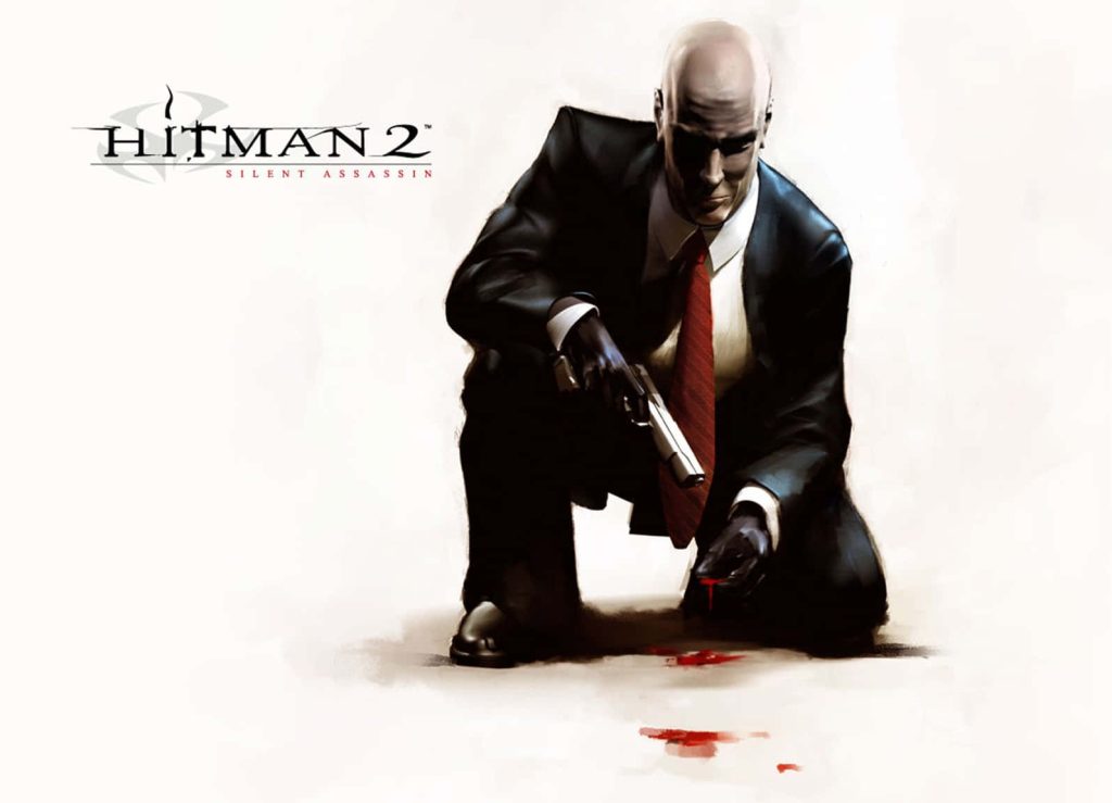 Agent 47 crouching in black suit with silenced pistol and bloodstain Hitman 2 wallpaper