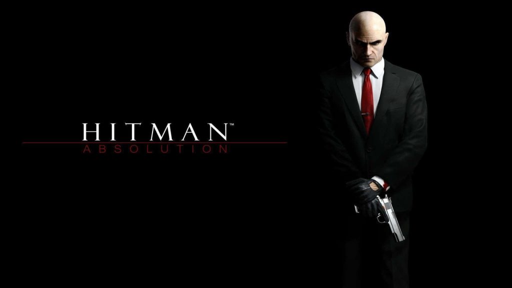 Agent 47 Hitman Absolution wallpaper in black suit red tie holding silver pistol minimalist design