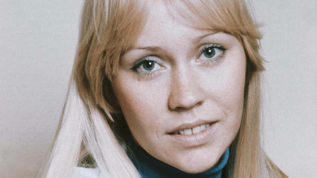 Close-up portrait of Agnetha from ABBA showcasing her iconic style and natural beauty wallpaper