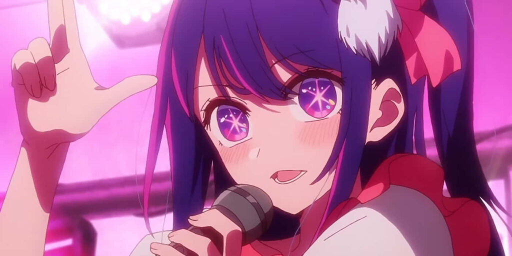 Ai Hoshino performing on stage with vibrant pink and purple lights holding microphone lively expression Wallpaper