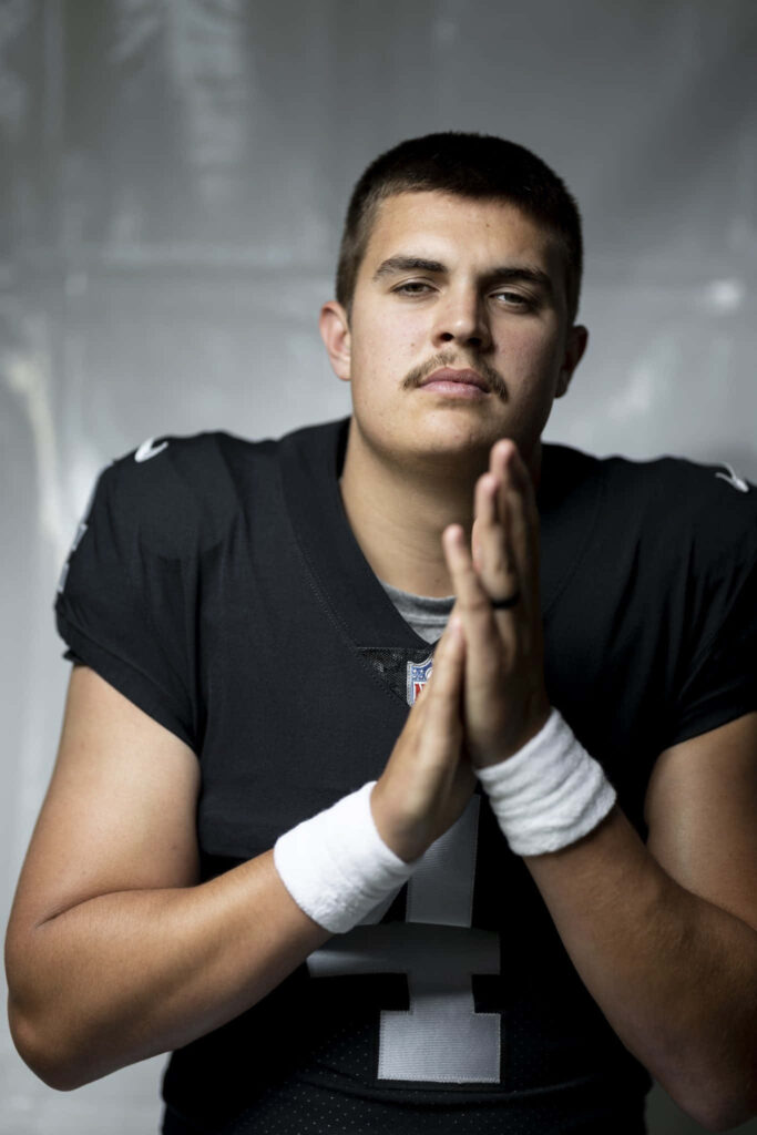 Aidan OConnell focused football portrait wallpaper showing intensity and readiness on field