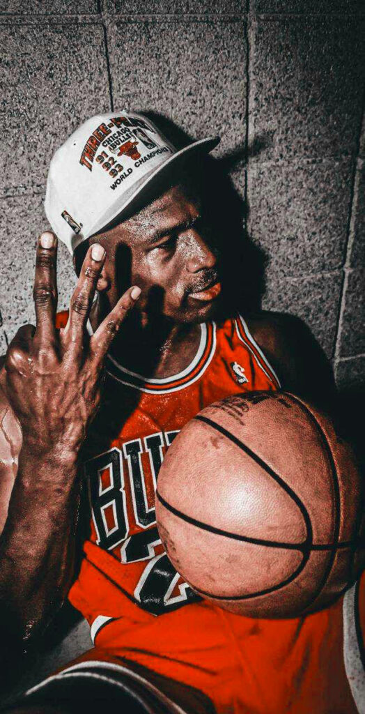 Magic in Motion: Michael Jordan's Iconic Pose Captured in a Timeless Lomo Shot Wallpaper