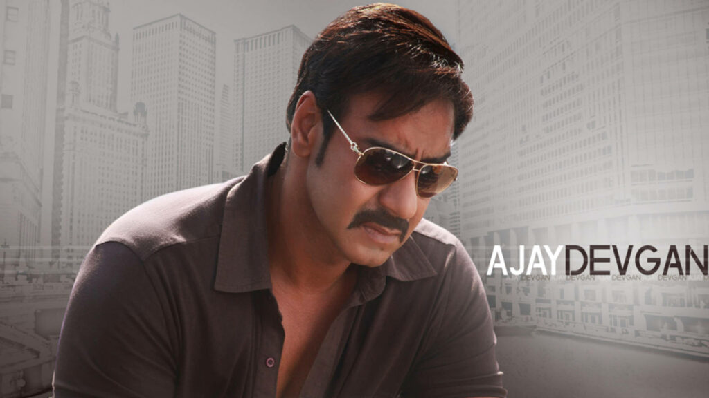 Ajay Devgn wearing sunglasses with illustrated skyscrapers urban cityscape wallpaper background