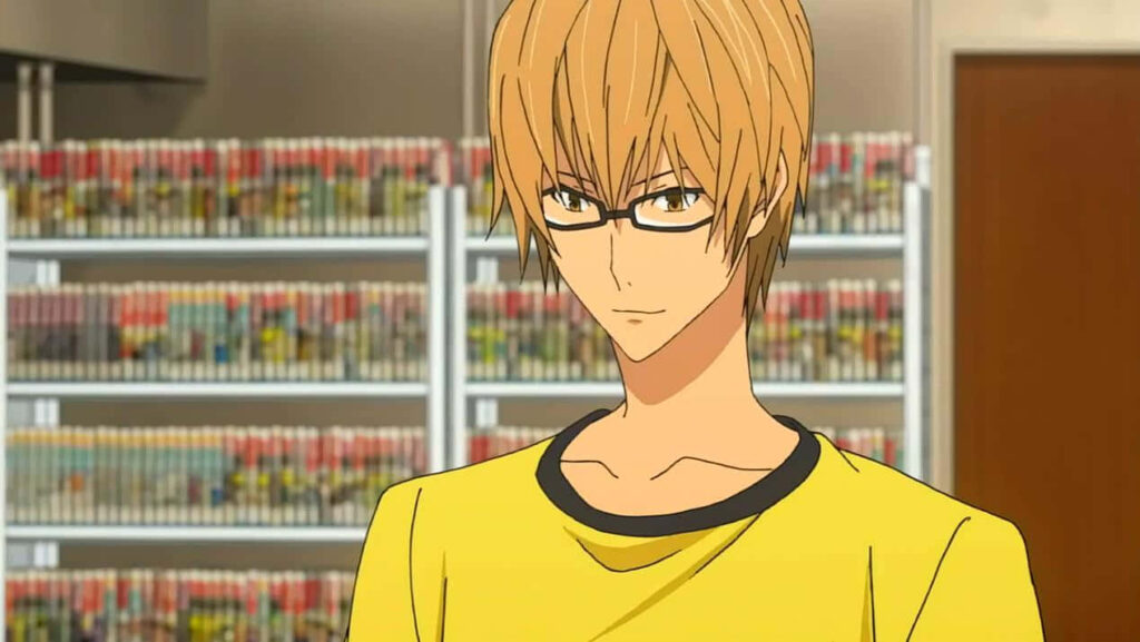 Akito Takagi Bakuman manga writer standing confidently by manga shelves wallpaper background