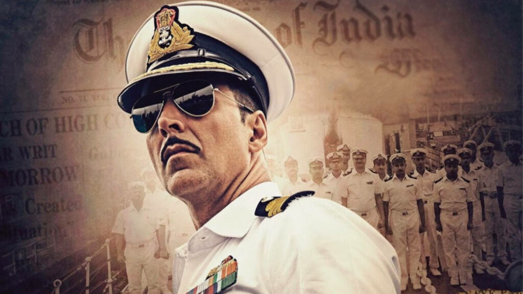 Akshay Kumar in Navy officer uniform from Rustom standing confidently with crew patriotic scene Wallpaper