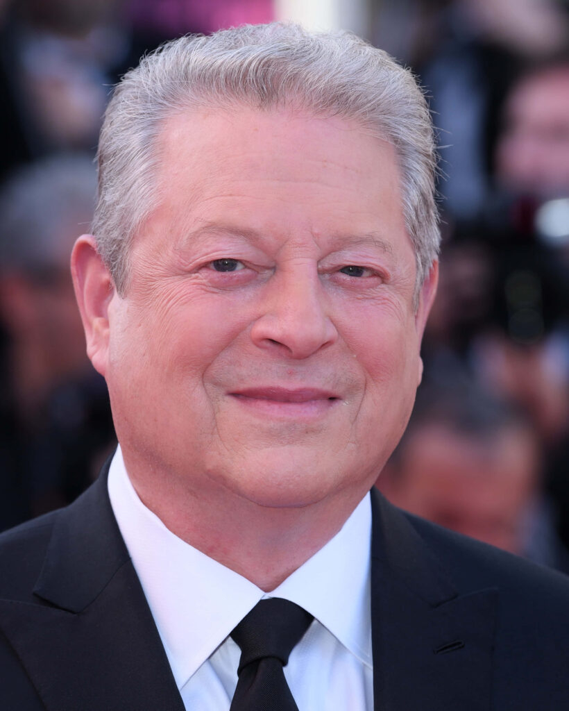 Close-up portrait of Al Gore American politician and environmentalist in formal attire background Wallpaper