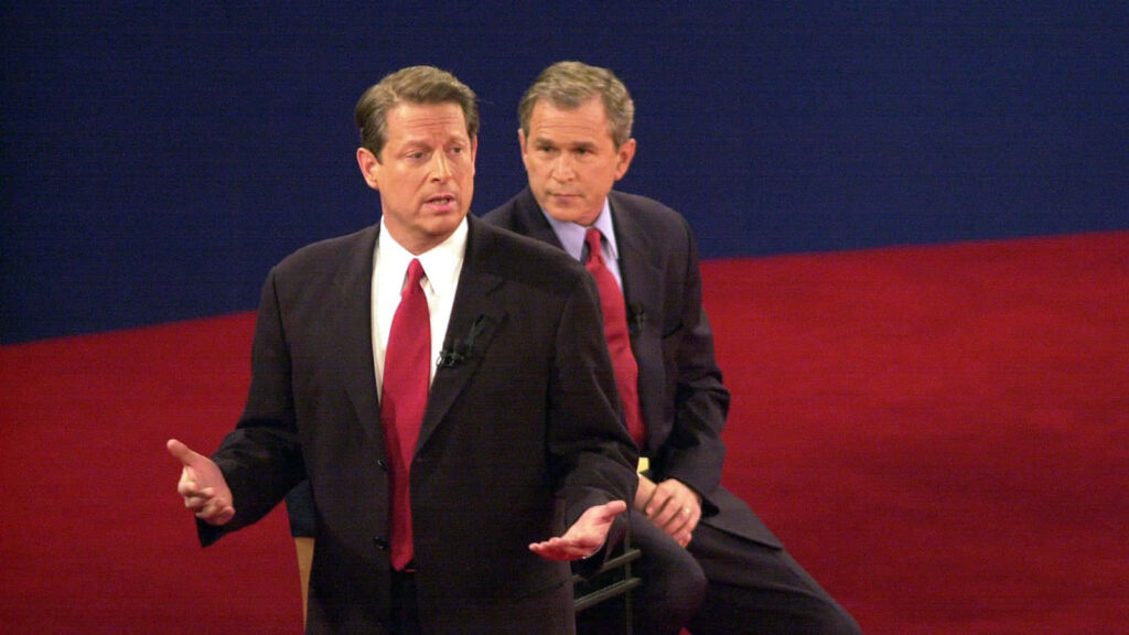 Al Gore speaking passionately during debate with George Bush historic American politics wallpaper