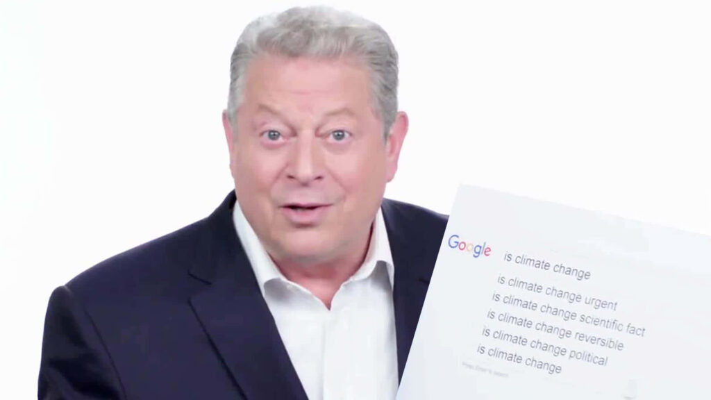 Al Gore discussing climate change answers in an informative environmental awareness wallpaper background
