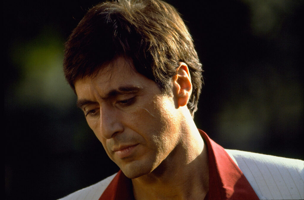Al Pacino as Scarface intense thoughtful pose iconic movie character wallpaper background