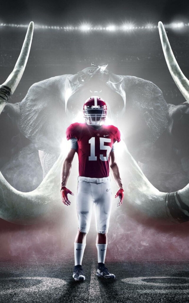 Alabama Crimson Tide player 15 in full gear with fierce elephant background strength wallpaper