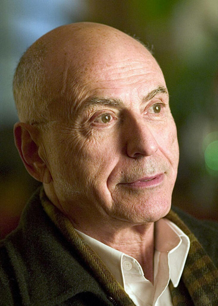 Portrait of Tony Award winner Alan Arkin with thoughtful expression and distinguished presence wallpaper