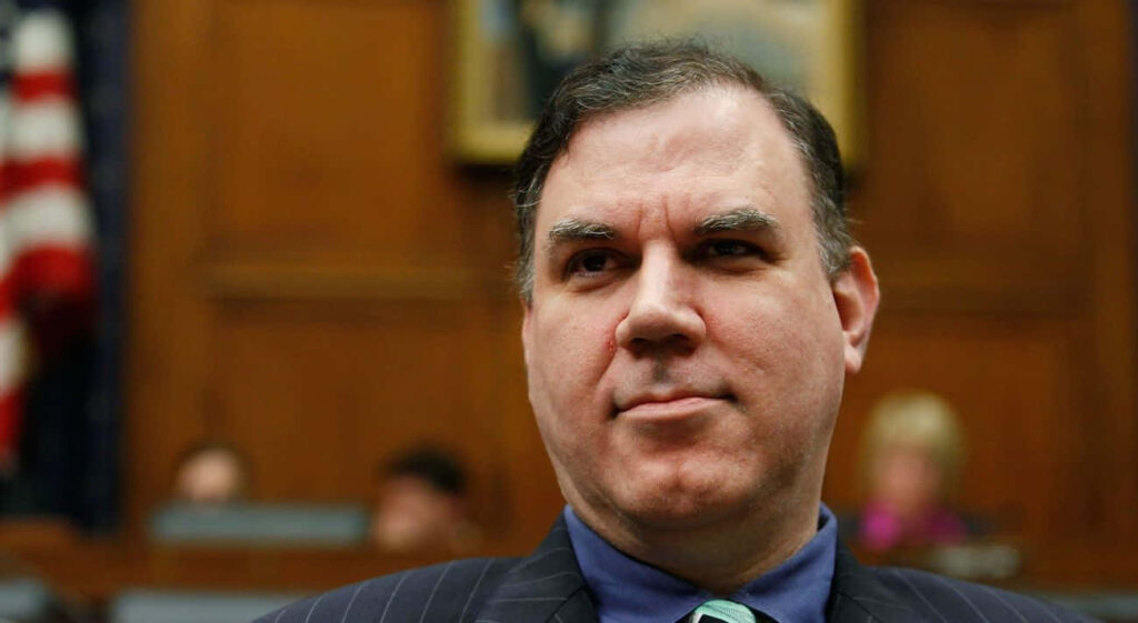 Alan Grayson confident smile wallpaper American politician formal government background image
