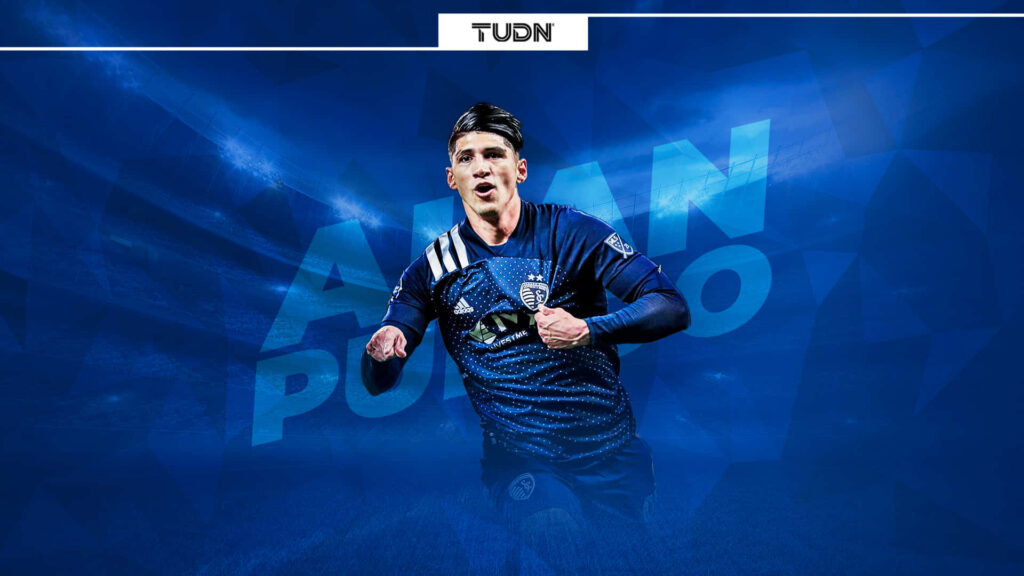 Alan Pulido Sporting Kansas City dynamic action shot blue wallpaper background energetic pose