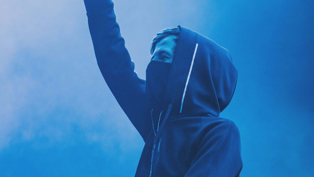 Alan Walker Live: Dynamic Stage Moment in Hoodie & Mask Wallpaper